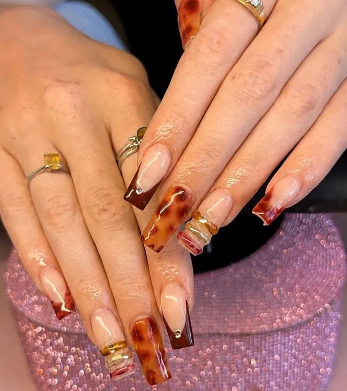 Tortoiseshell chrome French tip nail art
